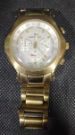 MONTE CARLO Relógio de pulso masculino ,á quartz, com caixa e pulseira em aço dourado, funcionando, sem garantia, no estado. Med: 5 cm. Obs: apresenta marcas do tempo