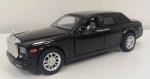 Miniatura em ferro do ROLLS ROYS com riquíssimos detalhes , abrem as portas e compartimentos traseiro e dianteiro. Ao abrir a porta  , acende o farol e produz efeitos do motor . Mede: 15 cm