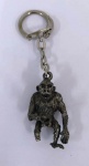 Antigo Chaveiro erótico de coleção com movimento em metal . Falta o pé do macaco .Mede: 4 cm 