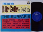 The Surfaris  Ensinando Hully Gully E Surfin' LP 60's Mono Brasil Surf Rock Bom Estado.LP Ediçao Brasileira 60's RGE. Capa em excelente estado. Disco em estado regular , com lotes de riscos superficiais e médios.