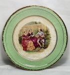 Antiguidade - Prato de parede em porcelana Nadir Figueiredo com famosa imagem do pintor Fragonard, apresenta manchas e está craquelado, medindo 20,5cm de diâmetro