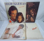 Colecionismo - Quatro antigos LPs de músicas sendo dois nacionais ELYMAR SANTOS 1988,  WANDO  " ...VULGAR E COMUM É NÃO MORRER DE AMOR" 1985 e dois internacionais JULIO IGLESIAS  " DE NIÑA A MUJER" 1981 e CREENDENCE CLEARWATER REVIVAL " PENDULUM"  1979.