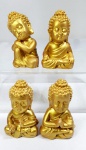 Quatro Budas bebês da felicidade, refletindo, em resina na cor dourada,  medindo 5cm de altura cada.