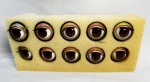 Cinco pares de  olhos de vidro para boneca na cor castanho, originais e nunca usados da década de 60, tamanho  T 14