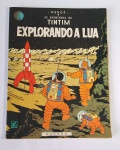 Livro - As Aventuras de TIMTIM - Explorando A Lua - Hergé - Editora Record - 1970 - Possui 62 páginas ilustradas em cores e textos - Possui desgaste na lombada, conforme fotos. Medida do livro: 27,5 x 20,5 cm.