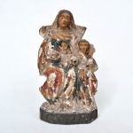 Santana Mestra - Antiga imagem de madeira policromada. Marcas naturais do tempo. Medida: 24cm x 14cm x 6cm.