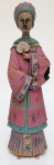 Santini - Imagem representando mulher oriental usando vestimentas na cor vermelho Medidas: 32cm altura x 8 cm largura