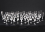 STRAUSS - Lote composto por 39 taças em cristal translúcido. Medida taça de champanhe: 20cm x 5,5cm. Medida taça de vinho branco: 17,5cm x 8cm. Medida taça vinho tinto: 16,5cm x 7,5cm. Medida taça vinho do porto: 15cm x 7cm.