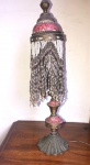Pequeno abajur oriental para 1 lâmpada com base de ferro. Medida: 40cm x 9,5cm. Retirada em Ipanema com hora marcada.