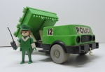 BRINQUEDO - Caminhão da Polícia Verde - Playmobil com boneco policial. (Faltando Peça). Produto conforme fotos originais do lote.