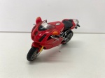 COLECIONISMO - Miniatura colecionável, moto DUCATI 999s em metal e plástico injetado, pneus borracha. Med. 7x12 cm. Produto conforme fotos originais do lote.