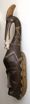 Cultura Guro, Costa do Marfim, Africa, século XX. Belíssima máscara em madeira entalhada e policromada. Altura = 64 cm.