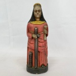PFS - Imagem sacra esculpida em madeira com policromia representando Santa Barbara, assinada na base, med. 29cm de altura. 
