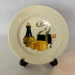 OXFORD - Prato para fondue em porcelana com desenhos pintados à mão e suporte em plástico, med. 18cm de diâmetro.