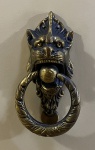 Aldrava de bronze. 17 cm de altura