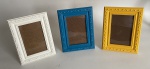 3 porta retratos de madeira. 21 x 16 cm
