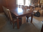 RICARDO DONDICI. Conjunto para jantar: Mesa e 12 cadeiras de madeira sucupira maciça. Detalhes na laterais da mesa em aço escovado.  Mesa: 110 x 300 x 77 cm de altura. Cadeira: 47 x 46 x 100 cm de altura