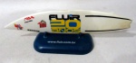 DIVERSOS, uma (1) plancha (prancha) miniatura de surf, confeccionada em polímero, acompanha suporte expositor, comemorativa aos 20 anos da FLUIR (www.fluir.com.br), medindo 20 cm comprimento.