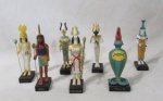 COLECIONISMO - Lote contendo sete (7) miniaturas em resina, ricamente policromada, representando a Coleção Mistérios Dos Deuses Egípcios - Salvat, sendo: Satet, Hator, Nekhbet, Shu, Neftis, Osiris e Uadjit. Medidas: 12 cm de altura, aproximadamente.
