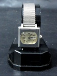 RELÓGIO - Um relógio de pulso unissex, da marca SEIKO, automático, caixa e pulseira em aço, possui calendário, usado, funcionando, porém sem garantias futuras de funcionamento. Medida da pulseira aberta: 11 cm de comprimento/ caixa 2,5 cm x 2,5 cm de largura.