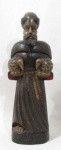 ARTE SACRA - Imaginaria de São Francisco esculpida em madeira policromada, assinada "ZPS" na parte frontal inferior, medindo: alt 42 cm x comp base 13 cm x larg base 11 cm. Vide fotos extras.