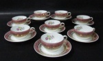 PORCELANA SCHMIDT - Oito xícaras para café com seus respectivos pires, em porcelana vitrificada branca, decoradas com motivos florais em rica policromia em reserva no interior das xícaras e ao centro dos pires, seguido de bordas adornadas com guirlandas de folhas e arabescos, generosos filetes e gregas em pintura à ouro, sobre faixa esmaltada na tonalidade rosa, alças vazadas arrematadas com vasta douração, marcados no fundo. Med. xícaras: alt 3,5 cm x diam 6,8 cm/ pires: 11 cm. Em ótimo estado!