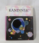 LIVROS - Um livro de capa dura, com textos e ilustrações em tons preto, branco e rica policromia, intitulado "KANDINSKY Ulrike Becks-Malorny", publicado pela TASCHEN. Medidas: 31 cm de altura x 25 cm de largura.