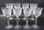 CRISTAL - Oito taças para licor em cristal europeu translucido ricamente lapidado à mão, com caneluras e sulcos , haste longa e serrilhadas apoiada sobre base circular estrelada. 3 taças com bicado. Medida 11 cm X 5 cm.