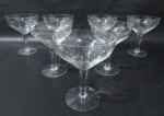 CRISTAL - Sete taças em cristal HERING decorada com estrelas e ranhuras haste lisa. Medida 12 cm X 9,5 cm.