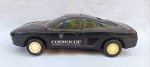 BRINQUEDO, um (1) carro COSMOCOP, marca CHAIN FONG TOYS, Made in Taiwan, tonalidade preta, a pilha, medindo 37 cm comprimento, usado, funcionamento não testado, sem garantia.