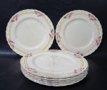 FAIANÇA - GRINDLEY MADE IN ENGLAND - Sete pratos rasos em faiança inglesa vitrificada na cor creme, com bordas onduladas e ornadas com faixas, filetes e frisos com esmaltagem multicoloridas e resquícios em pintura à ouro, marcados no fundo. Med. diam 23 cm. Dois pratos possui fios de cabelo e um com pequenas marcas do tempo.