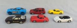 BRINQUEDOS, seis (6) carrinhos miniatura: 1 Porsche 356A, marca MAISTO, medindo7,5 cm; 1 Chevrolet Camaro Concept, marca MAISTO, medindo 7 cm; 1 Volvo XC 90, marca MAISTO, medindo7 cm; 1 Porsche Turbo, marca MATCHBOX, medindo 7 cm; 1 Porsche Carreras 911, marca WELLY, medindo 7,5 cm; 1 azul da marca HOTWHEELS  MATTEL, medindo 8 cm, todos usados.
