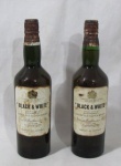 BEBIDAS - Lote contendo duas garrafas lacradas de "BLACK & WHITE", Whisky's Escoceses. NÃO GARANTIMOS A INTEGRIDADE DOS LÍQUIDOS.