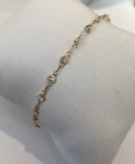 PULSEIRA INFANTIL CONFECCIONADO EM OURO AMARELO 18K, COM ZIRCONIA BRANCA CORAÇÃO, PESO: 1,2g, TAMANHO: 14cm. VALOR DE MERCADO: R$ 1.000,00