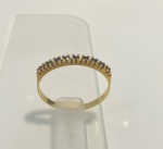 MEIA ALIANÇA CONFECCIONADA EM OURO AMARELO 8K 750 COM 9 SAFIRAS NATURAIS, PESO: 0,8g, TAMANHO DO ANEL: 12, VALOR DE MERCADO: R$ 800,00