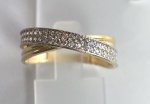 ANEL TRANÇADO CONFECCIONADO EM OURO AMARELO E OURO BRANCO 18K, COM  ZIRCONIAS BRANCAS, PESO: 2,9g, TAMANHO DO ANEL: 16  VALOR DE MERCADO: R$ 2.560,00