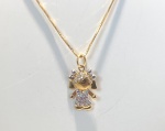CONJUNTO CORRENTE VENEZIANA E PINGENTE MENINA CONFECCIONADA EM OURO 18K, COM 26 DIAMANTES DE 1 PONTO CADA TOTAL: 0,26ct, TAMANHO DO PINGENTE: 19mm, TAMANHO DA CORRENTE: 45cm, PESO: 4,4g. VALOR DE MERCADO: R$ 4.000,0