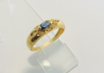 ANEL CONFECCIONADO EM OURO AMARELO 18K, 1 SAFIRA DA EM NAVETE COM 8 PONTO E 8 DIAMANTE DE 1 PONTO CADA, TOTAL: 0,08ct, PESO: 2,8g, TAMANHO DO ANEL: 20, VALOR DE MERCADO: R$ 3.000,00