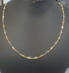 GARGANTILHA RIVIERA CONFECCIONADA EM OURO AMARELO 18K, COM ZIRCONIAS COLORIDAS OVAL, PESO: 4,5g, TAMANHO: 45cm. VALOR DE MERCADO: R$ 4.000,00