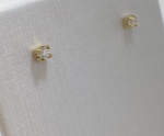 BRINCO CARTIER CONFECCIONADO EM OURO AMARELO 18K, COM ZIRCONIA BRANCA, PESO: 1,2g, VALOR DE MERCADO: R$ 800,00