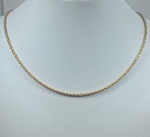 CORRENTE CORDÃO TRANÇADO CONFECCIONADO EM AMARELO 18K, PESO: 3,2g, TAMANHO DA CORRENTE 42cm, VALOR DE MERCADO: R$ 2.000,00