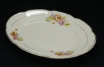 PORCELANA POLONESA - CHODZIEL - Travessa oval com decoração floral. Med. 4x29x20 cm.