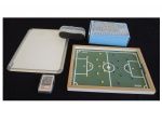 Quatro brinquedos, quadro mágico com apagador, um campo de football de botão e um puzzle eraser incompleto  e trunfo, 40 x 29 cm.