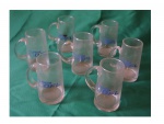 Sete canecas para chopp de vidro com logo Nova DFL.