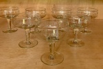CRISTAL - SETE TAÇAS PARA ESPUMANTE, BORDAS BAIXAS COM LAPIDAÇÃO.