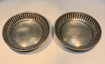 DUAS PEQUENAS SALVAS EM PRATA 800. MANUFATURA UNIÃO.MEDINDO: 7,5CM. PESO; 55 GRAMAS.