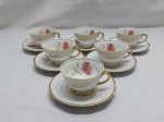 Jogo de 6 xícaras de chá em porcelana Real flor rosa, friso ouro, gravado "M.P.".