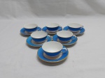 Jogo de 6 xícaras de café em porcelana São João Recife, barra azul com friso ouro.
