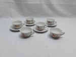 Jogo de 6 xícaras de café com 4 pires em porcelana Pozzani floral, friso ouro.