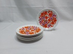 Jogo de 6 pratos de sobremesa em porcelana Renner Medaillon flor laranja. Medindo. 17,5cm de diâmetro.